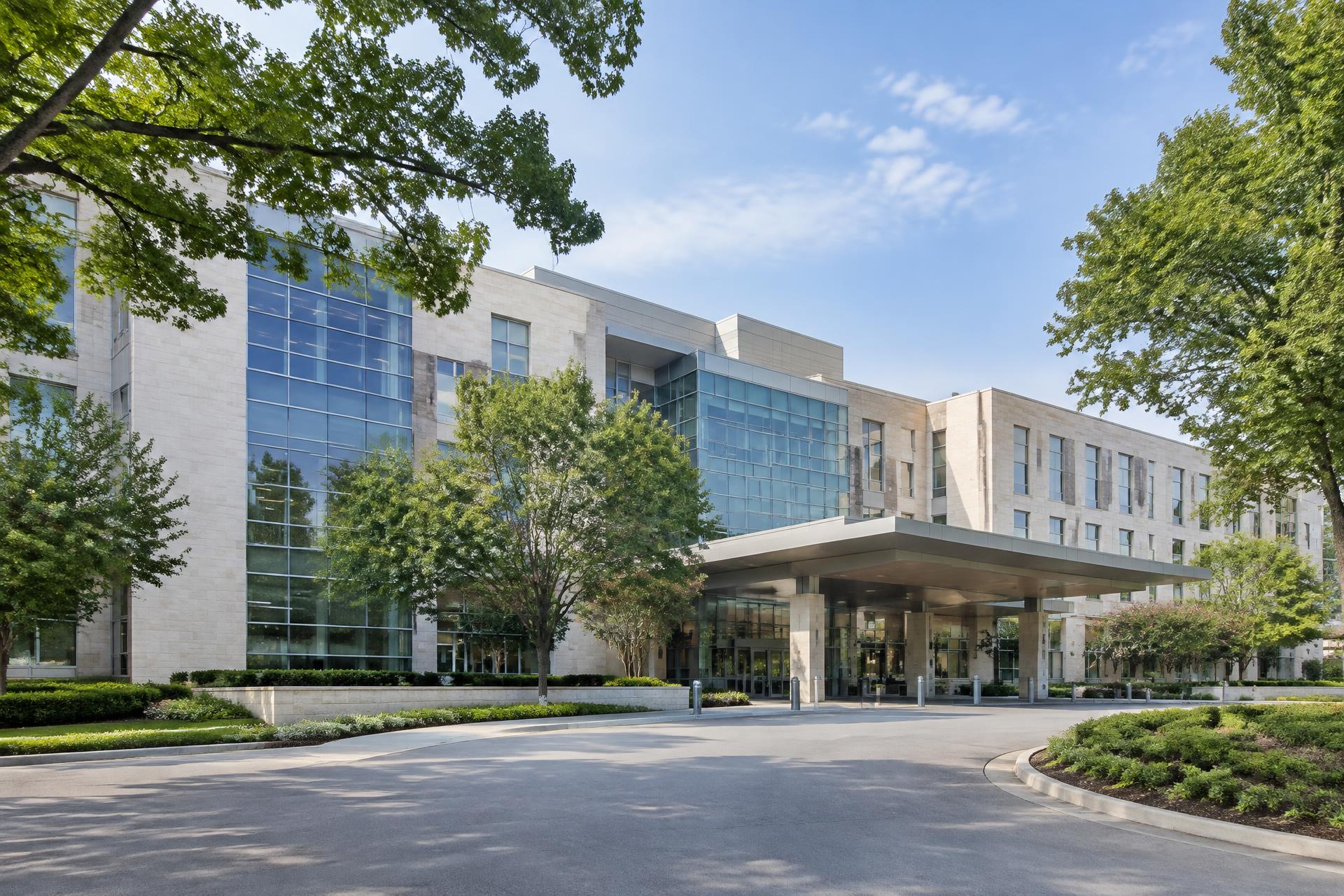 Hospital architecture framed by mature trees
