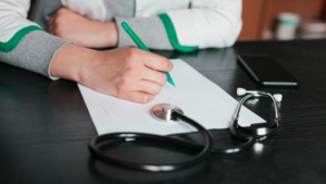 Nurse fills out a document